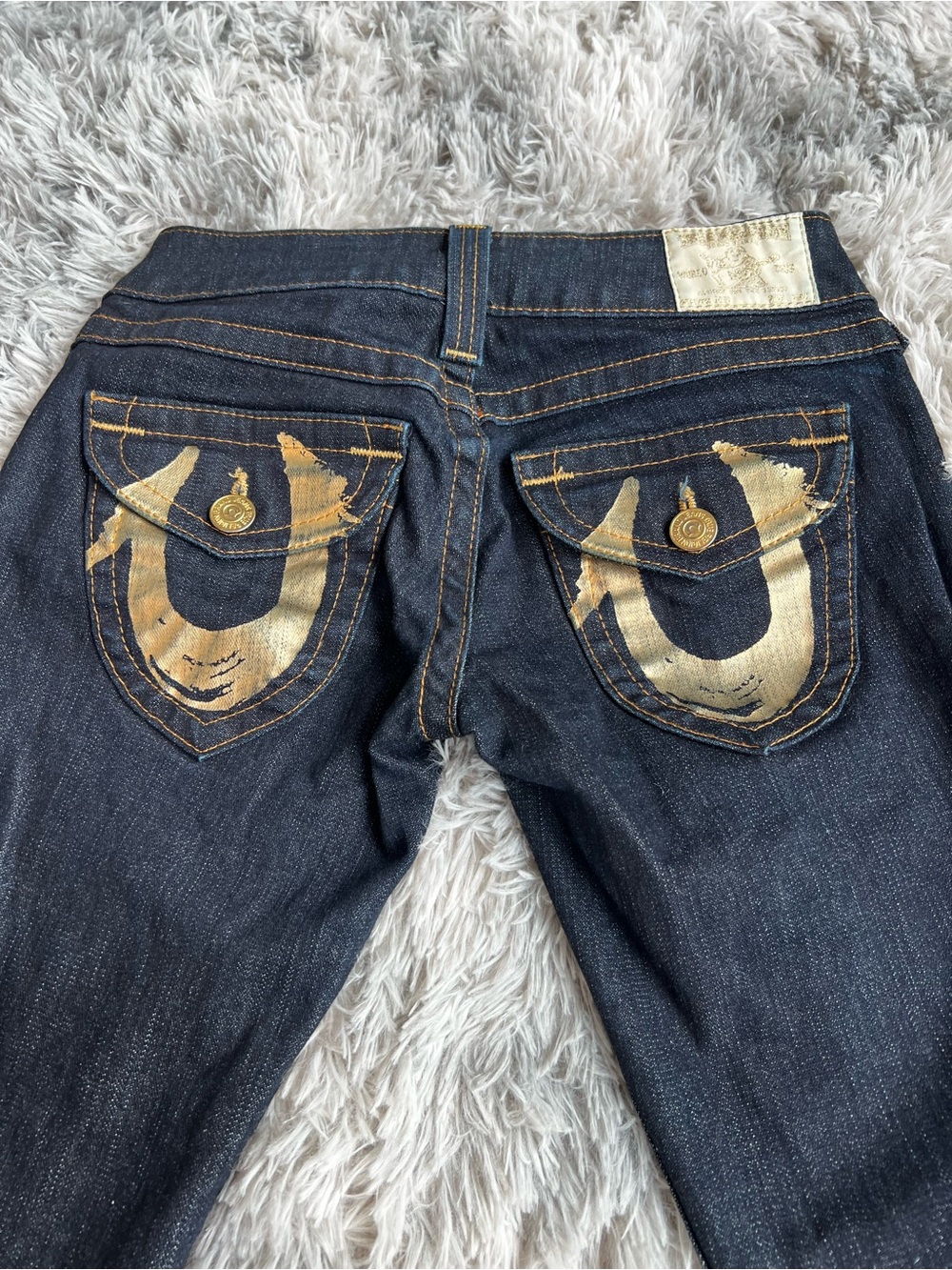True Religion women’s Dark Indigo Slim Straight Jeans with Gold Pocket Detail